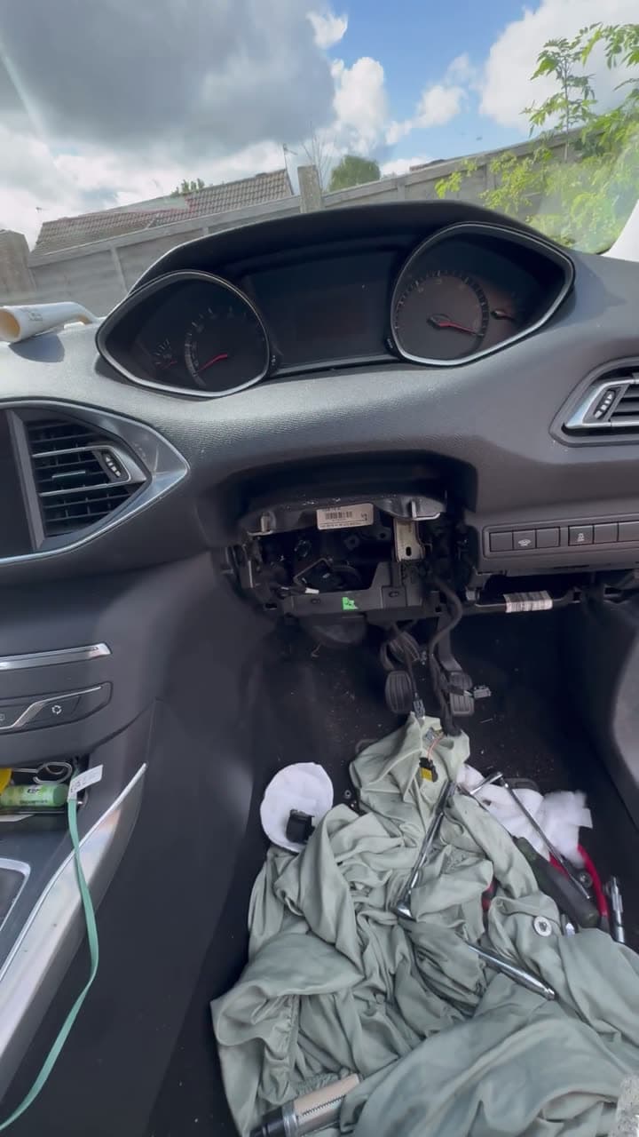 Still from the Heater blower repair on a 2015 Peugeot 308, with the dashboard stripped to reach the blower motor video